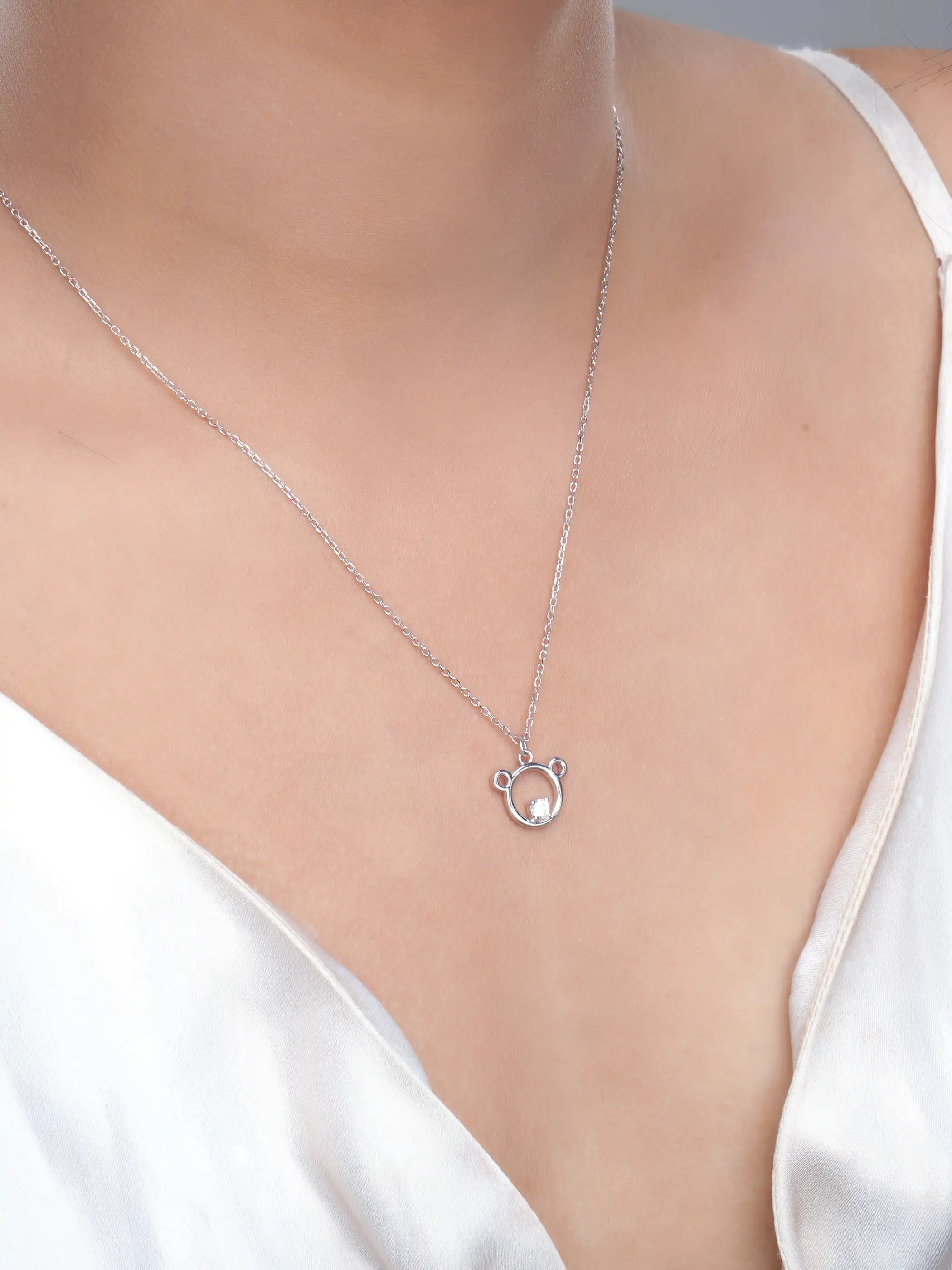925 silver bear outline pendant necklace with crystal accent on a delicate chain