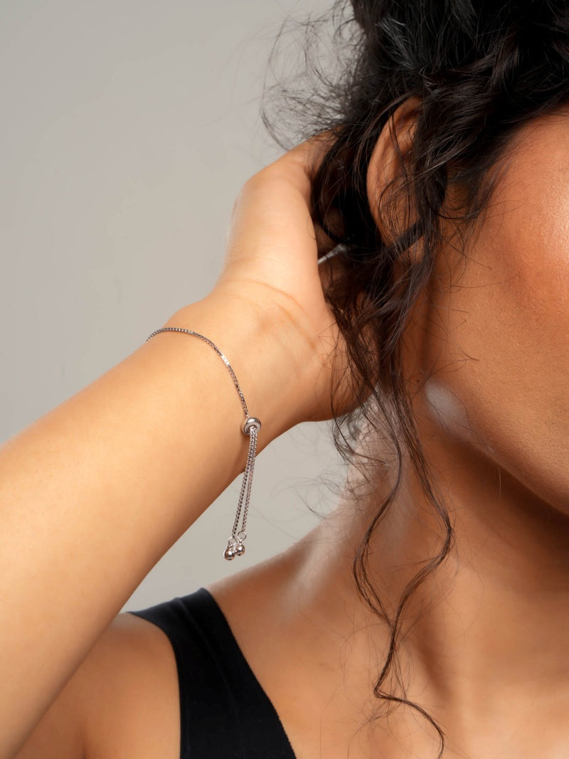 925 silver adjustable bracelet with rectangular cubic zirconia plate and blue evil eye center charm