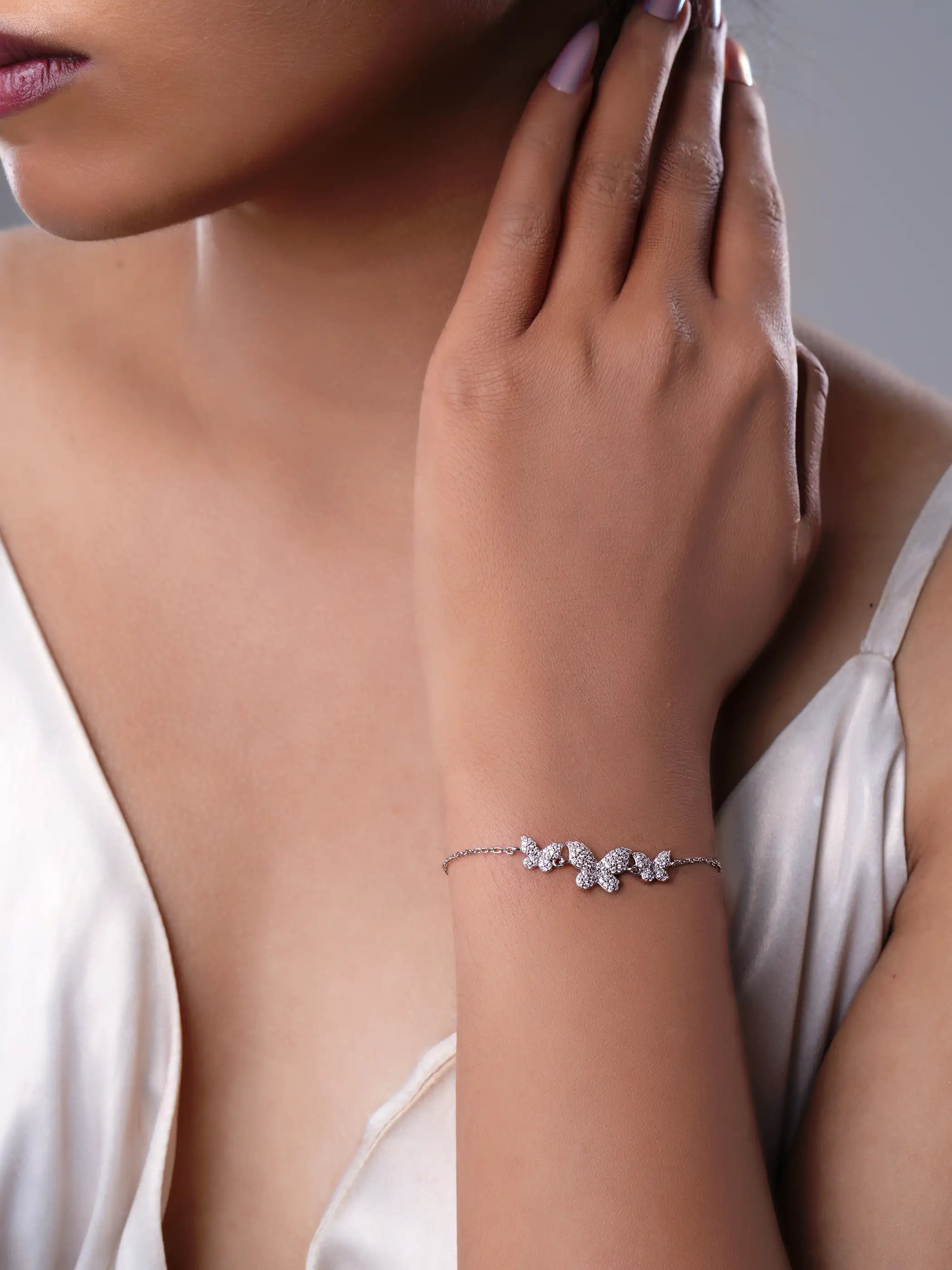 925 silver adjustable bracelet with three crystal-studded butterfly charms on a delicate chain