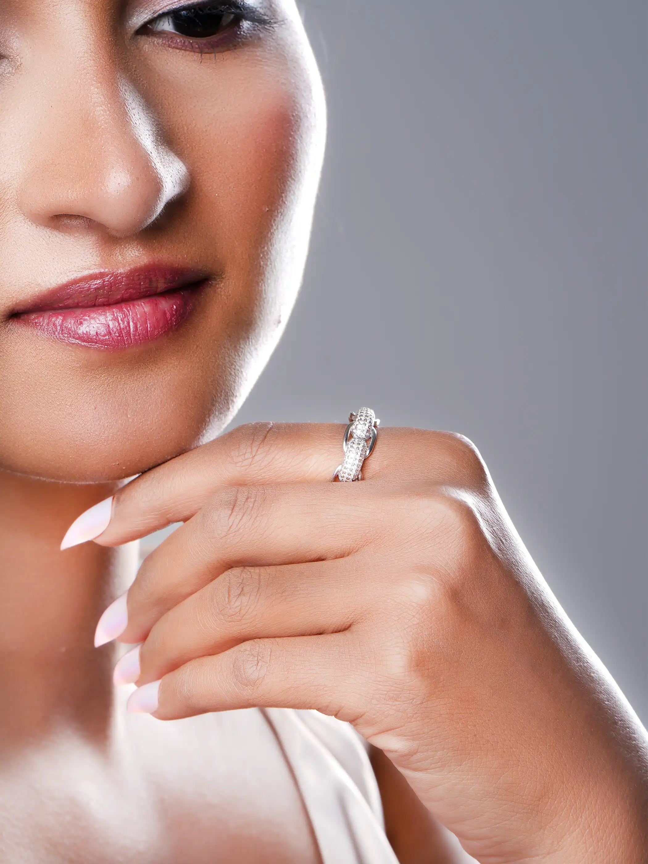 925 silver braided ring with pavé CZ stones in a sleek intertwined band design