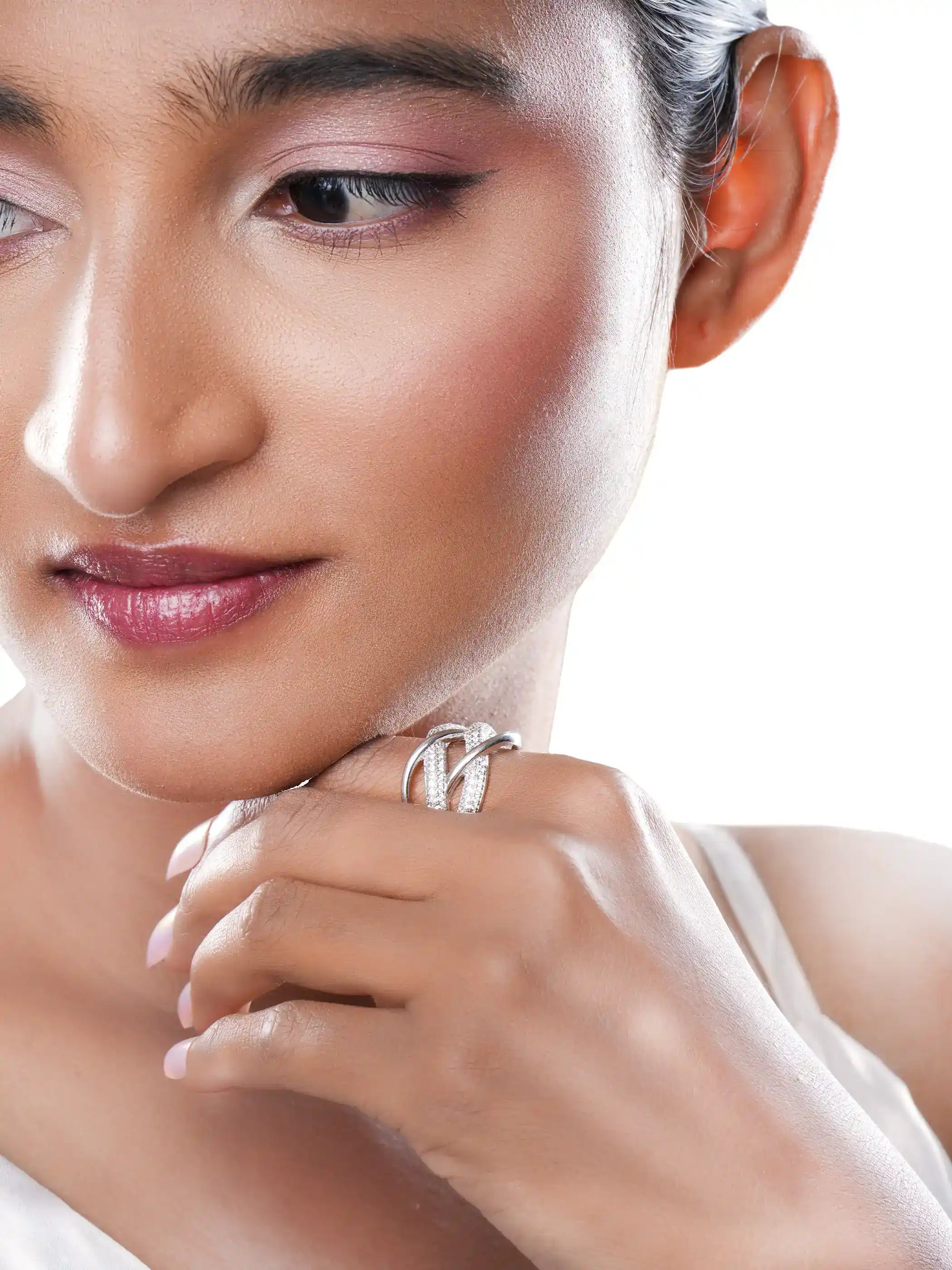 925 silver crisscross ring with pavé CZ stones in an intertwined band design