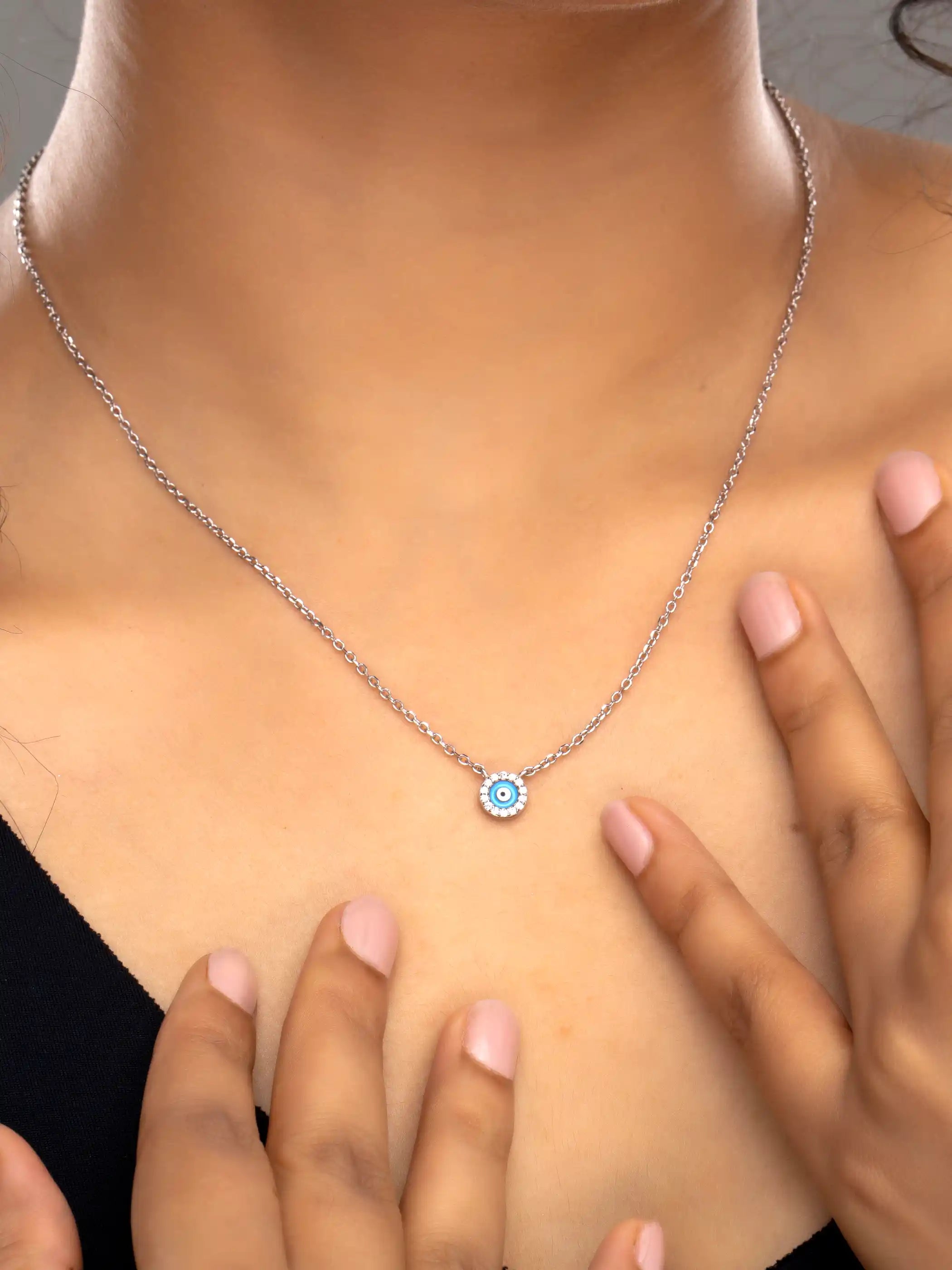 925 silver evil eye pendant with blue enamel centerpiece on delicate chain
