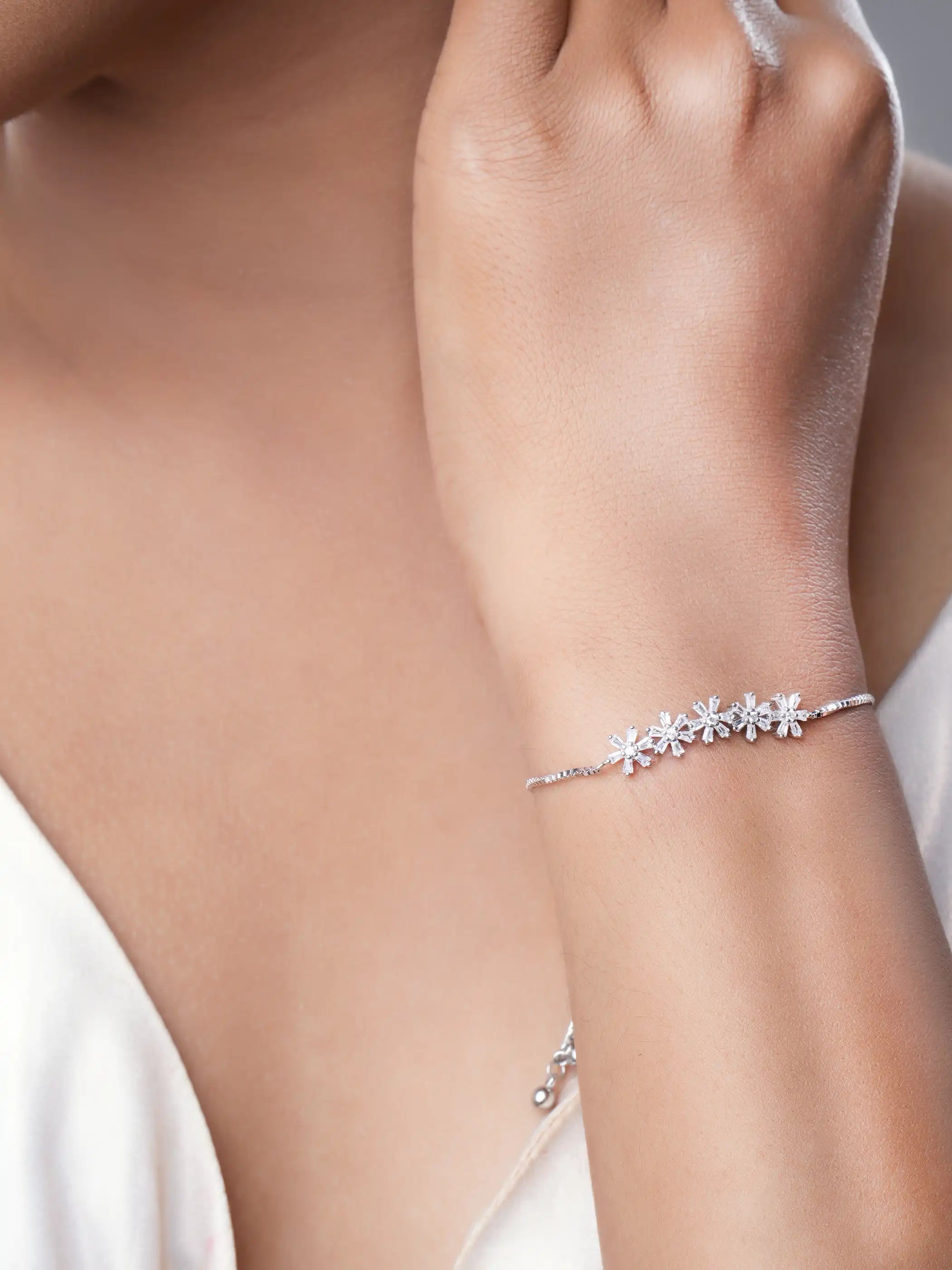 925 silver floral bracelet with CZ studded blossoms with adjustable chain design
