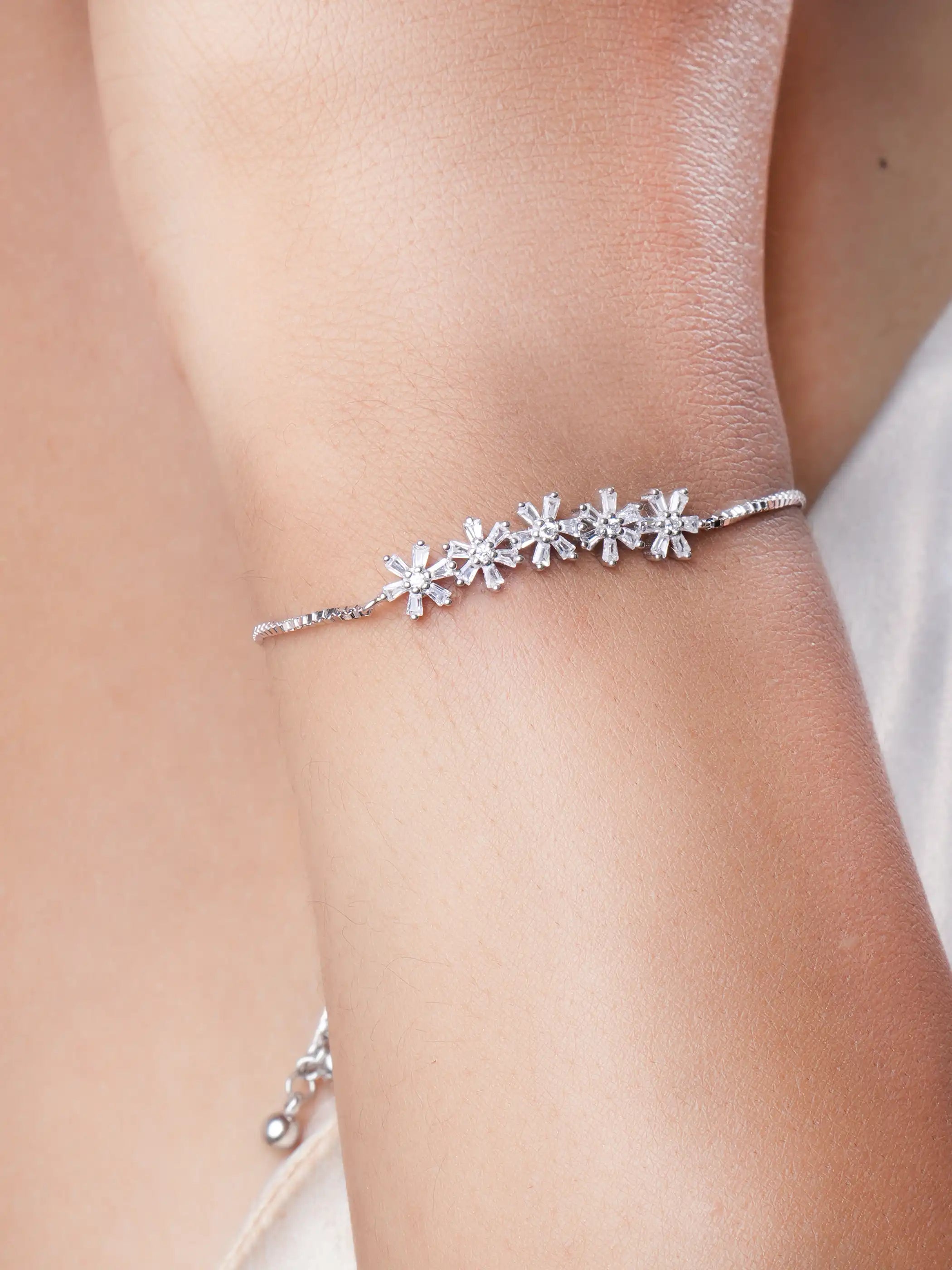 925 silver floral bracelet with CZ studded blossoms with adjustable chain design