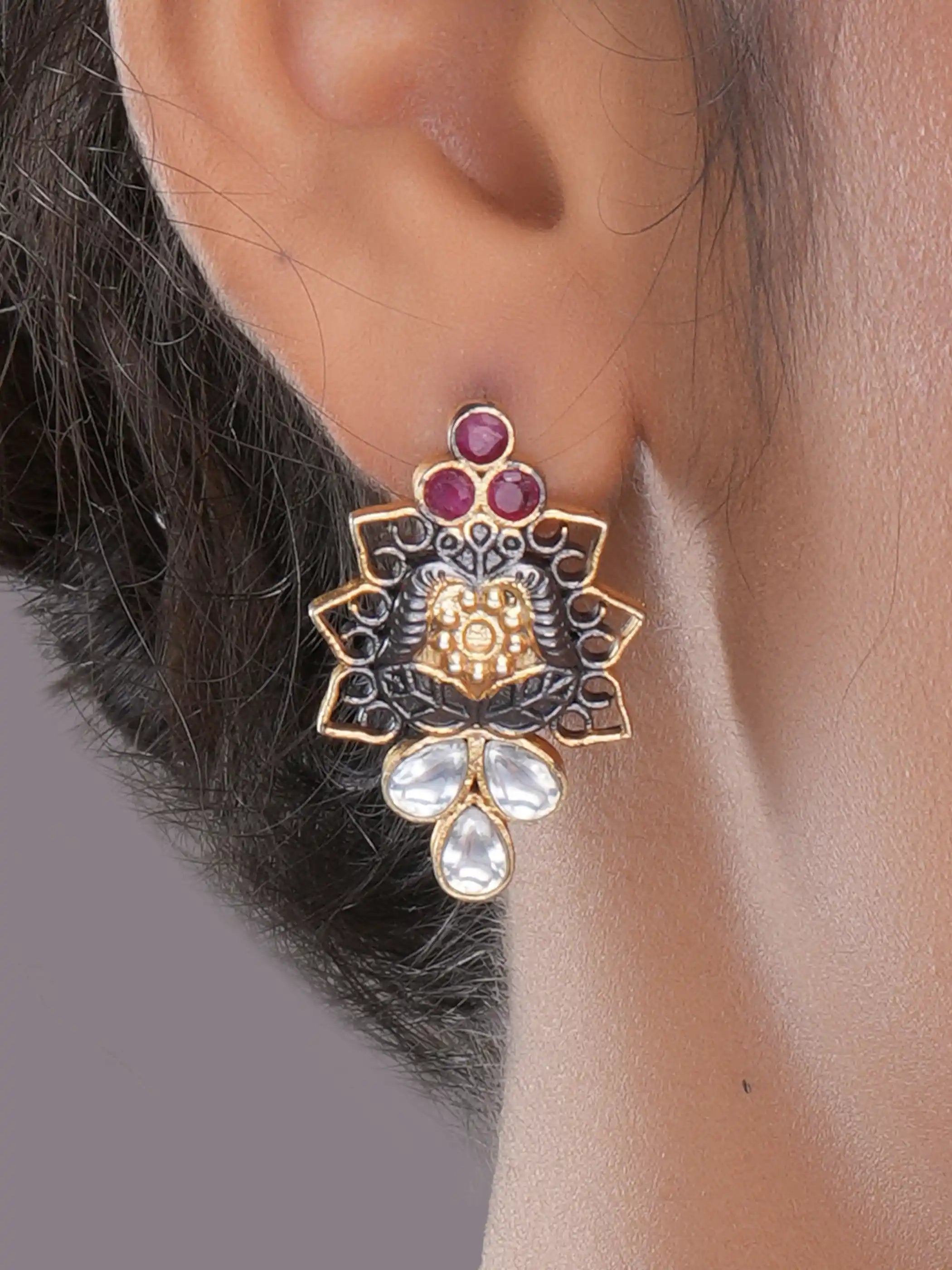 925 silver floral earrings with ruby red and teardrop crystal stones in oxidized gold detailing