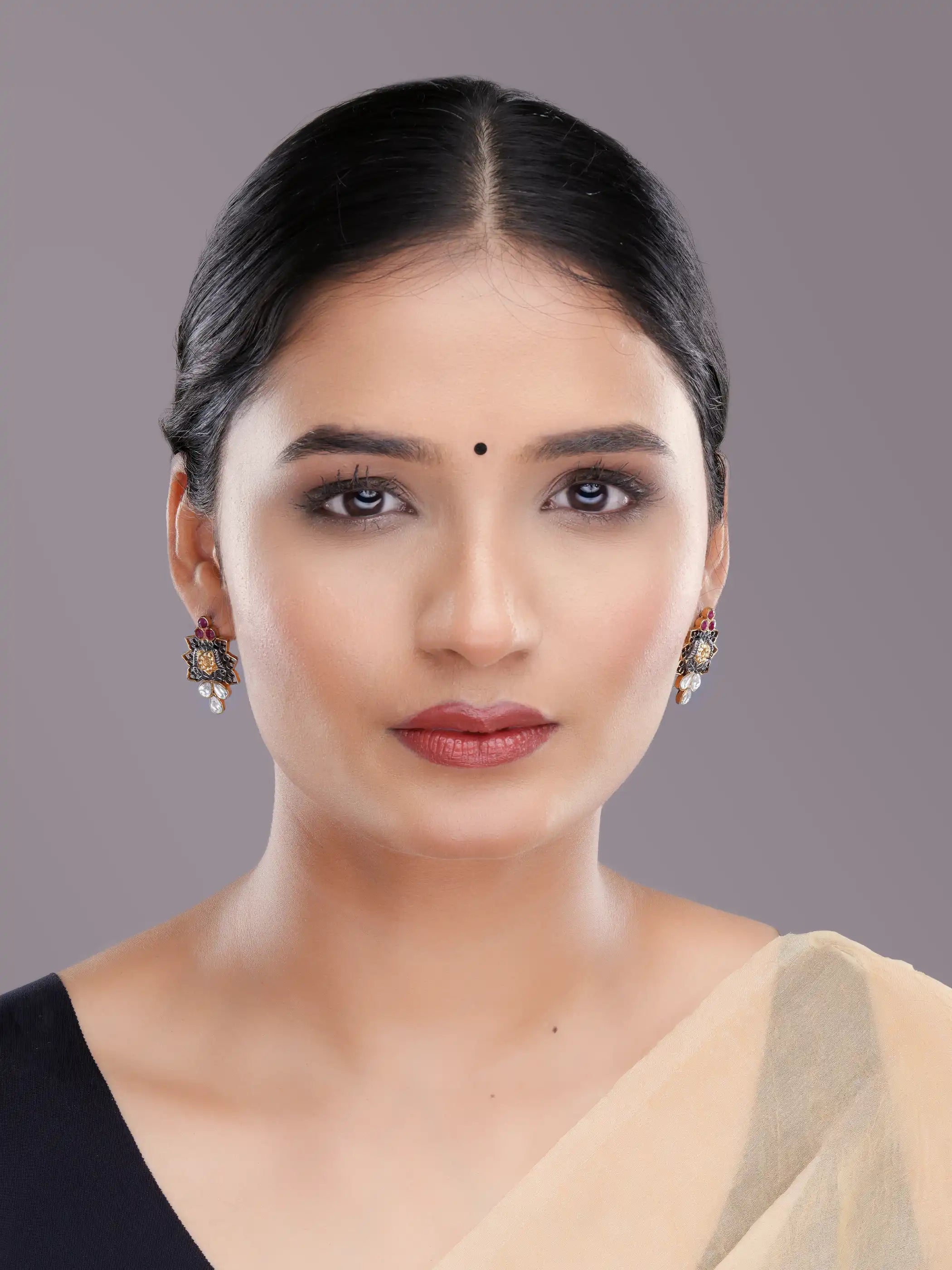 925 silver floral earrings with ruby red and teardrop crystal stones in oxidized gold detailing