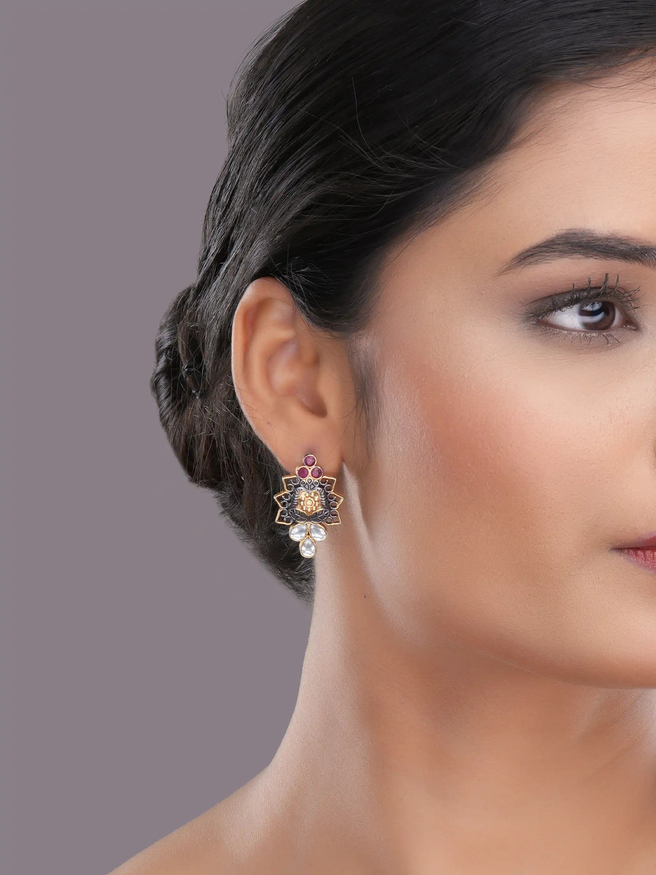 925 silver floral earrings with ruby red and teardrop crystal stones in oxidized gold detailing