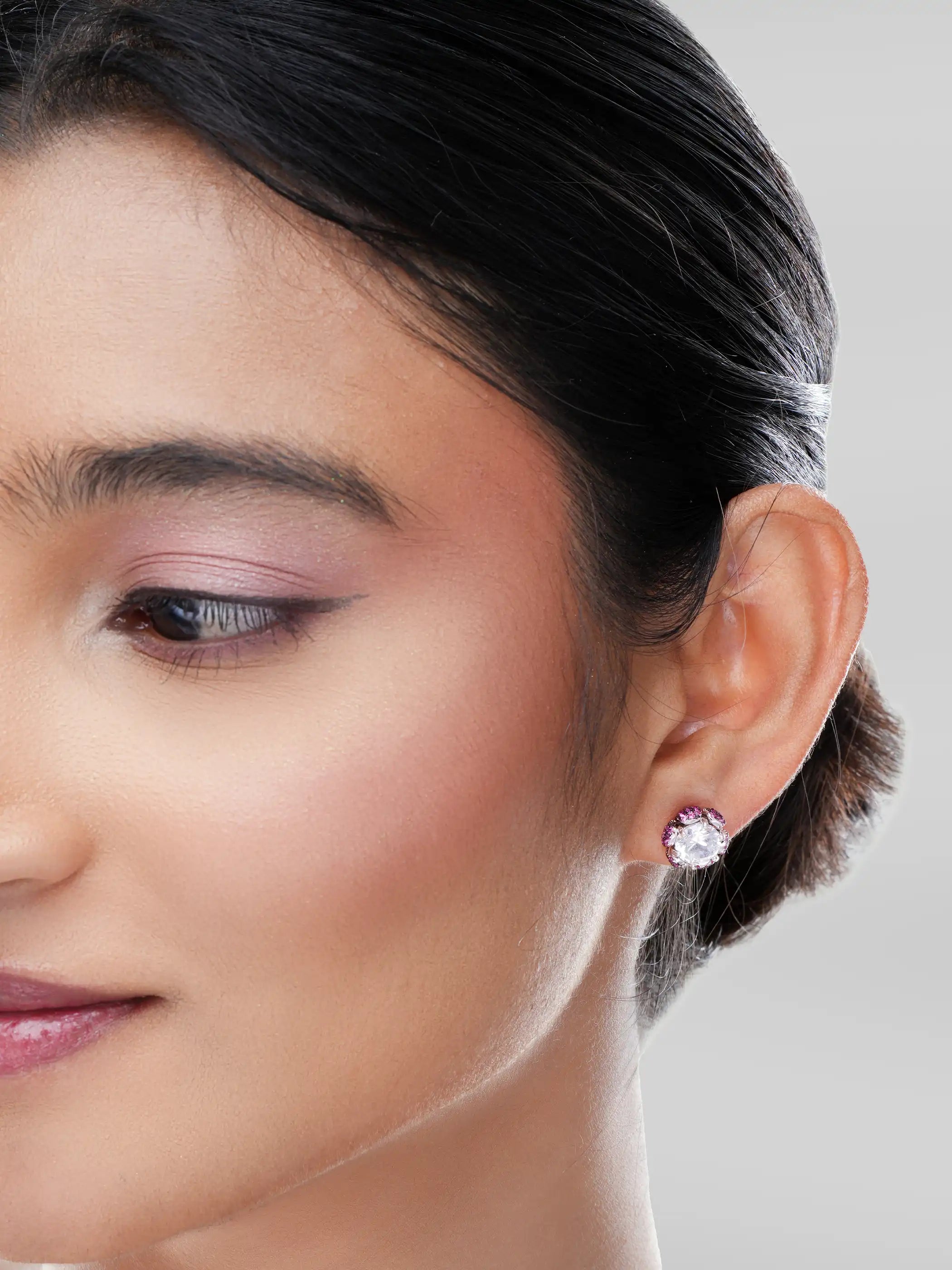 925 silver mismatched stud earrings with pink leaf motif and crystal-studded floral design