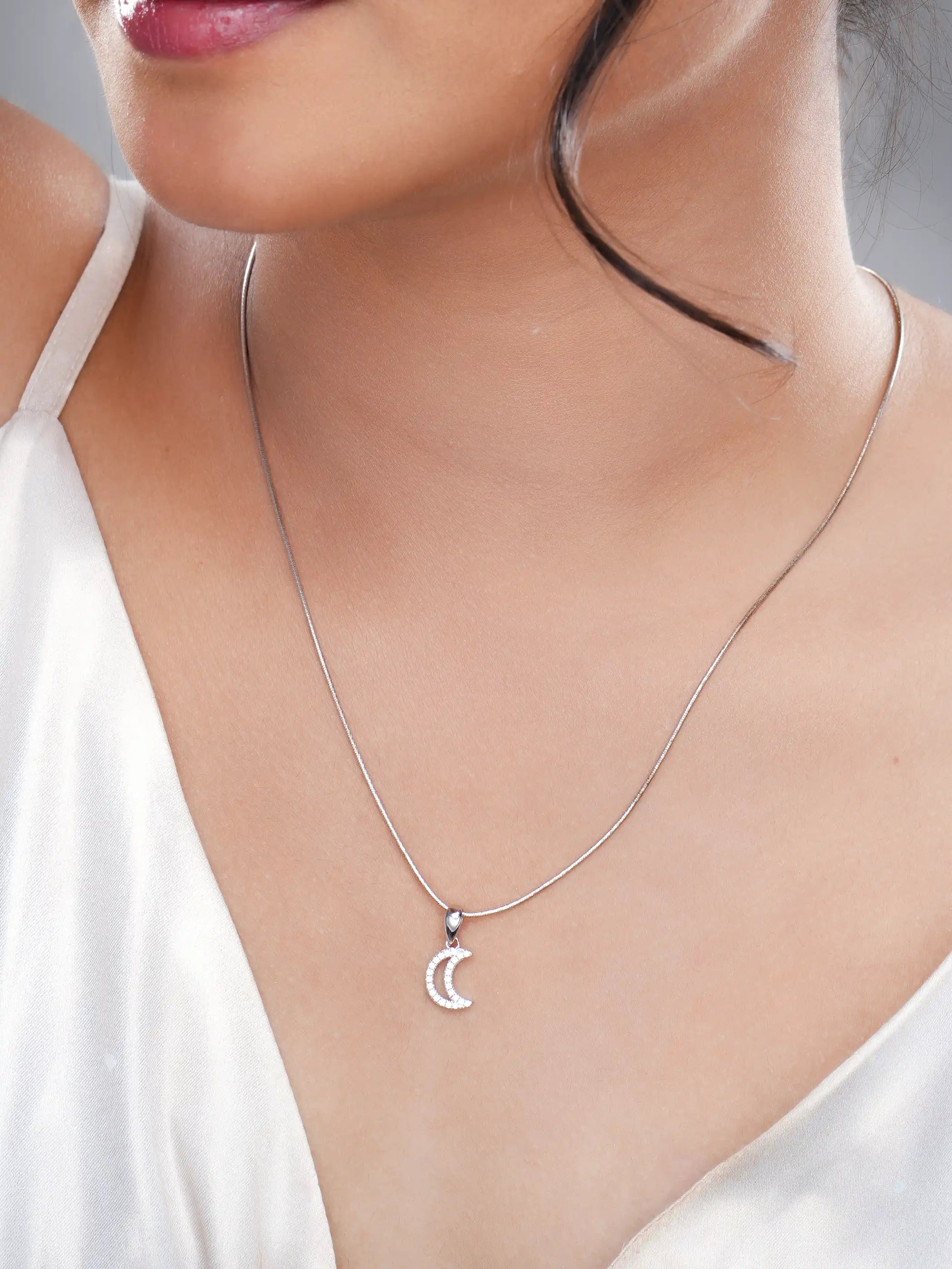 925 silver crescent moon pendant with crystal pavé detailing and polished bail for a celestial-inspired design