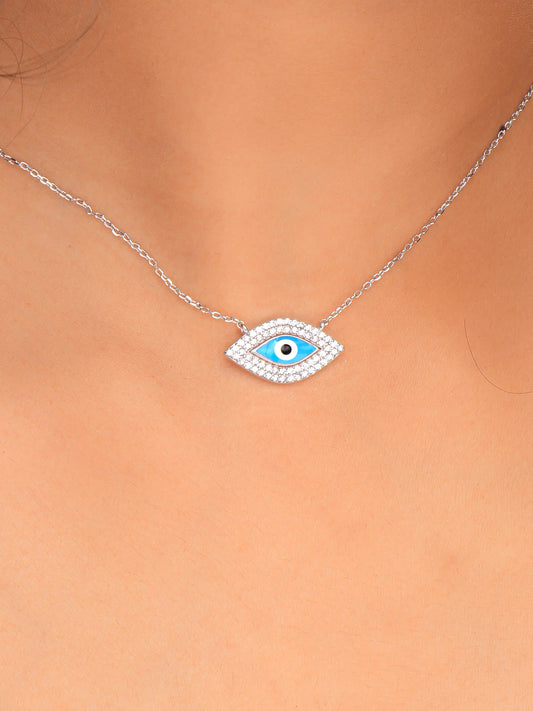 925 silver necklace with blue evil eye pendant framed in sparkling stones, symbolizing protection and modern elegance