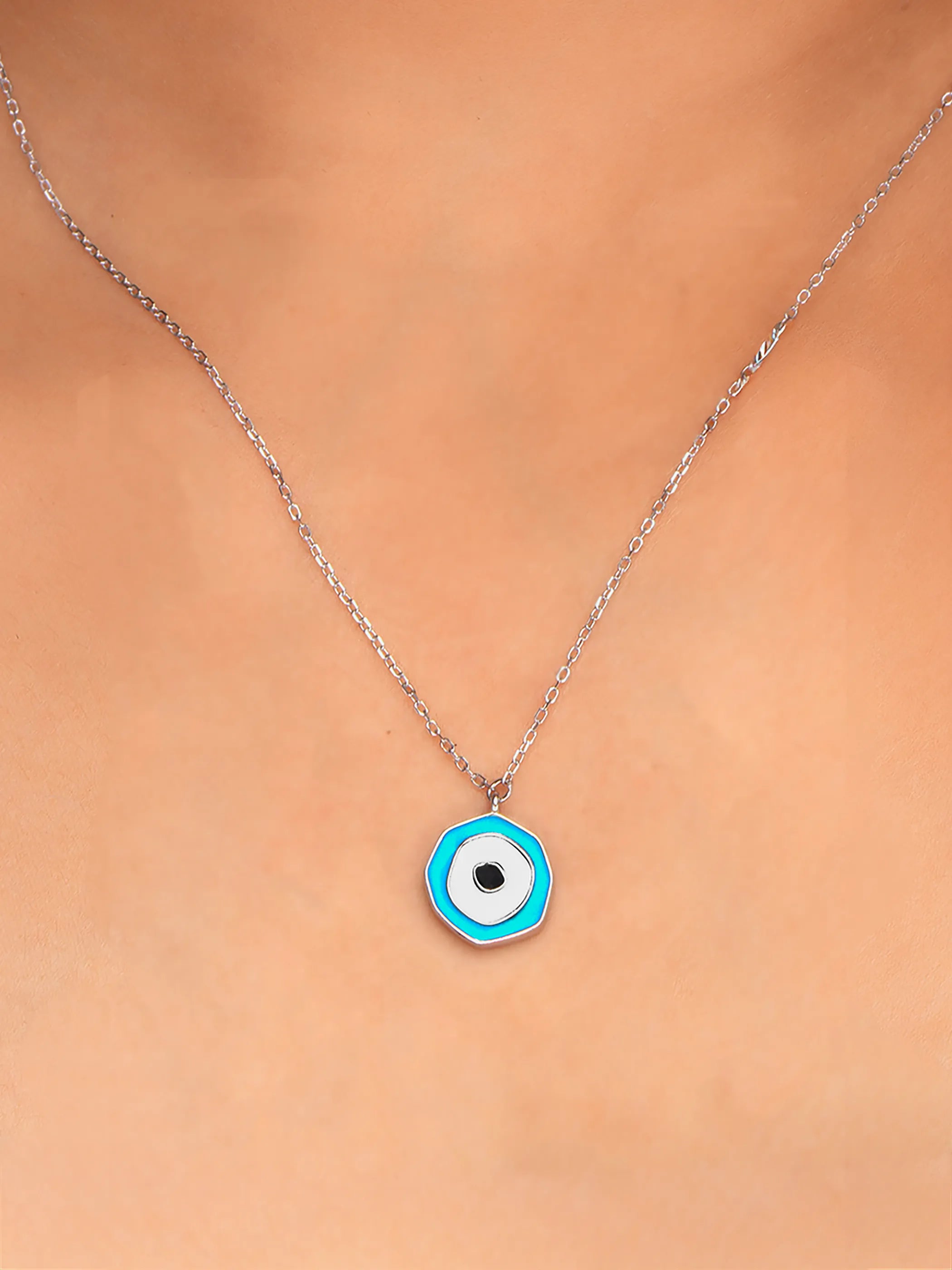 925 silver necklace with a hexagon-shaped blue evil eye pendant, minimal design for everyday protection and style