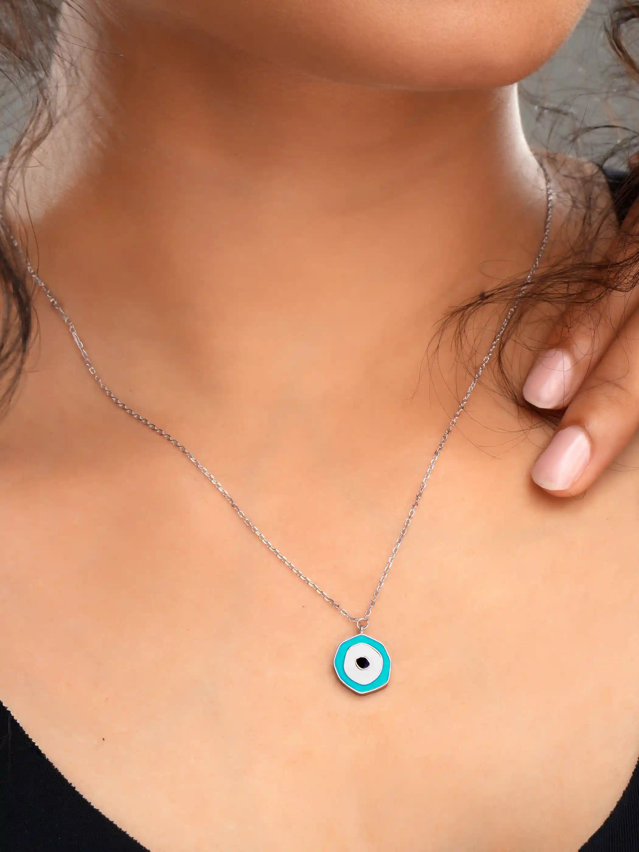 925 silver necklace with a hexagon-shaped blue evil eye pendant, minimal design for everyday protection and style