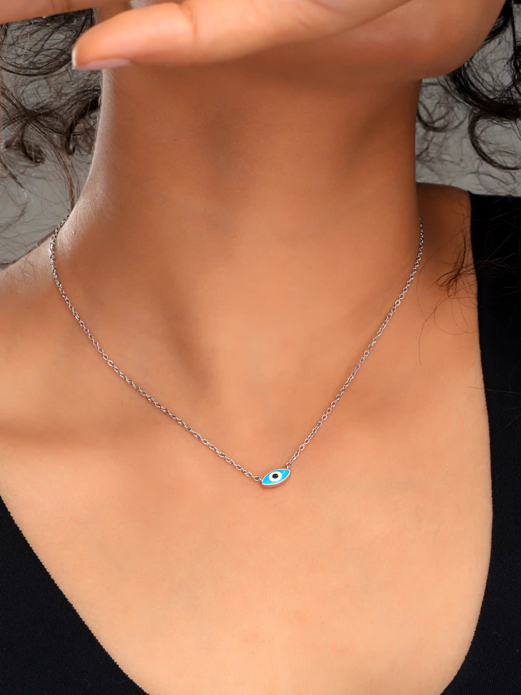 925 silver necklace featuring a single blue evil eye charm on a delicate chain for minimalist style and protection