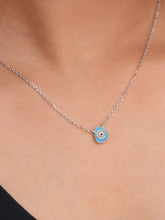 925 silver necklace with a light blue evil eye pendant surrounded by crystal detailing on a delicate chain for everyday protection and style