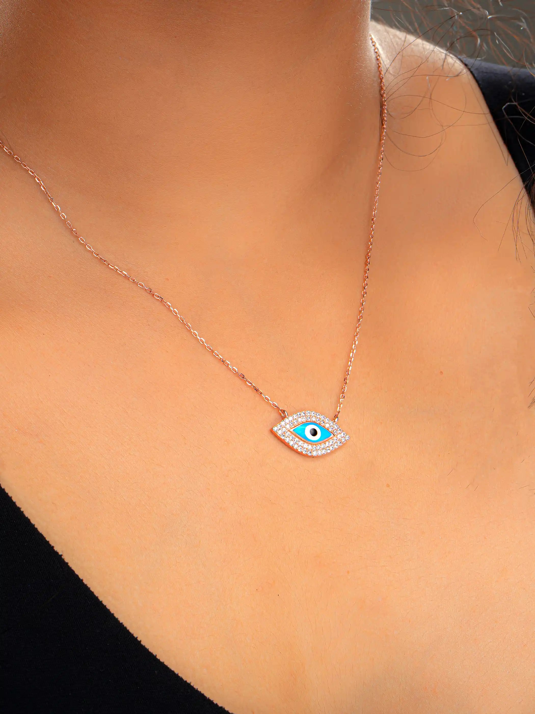 925 silver necklace with mother-of-pearl evil eye pendant in an outlined eye shape, symbolizing protection and elegance