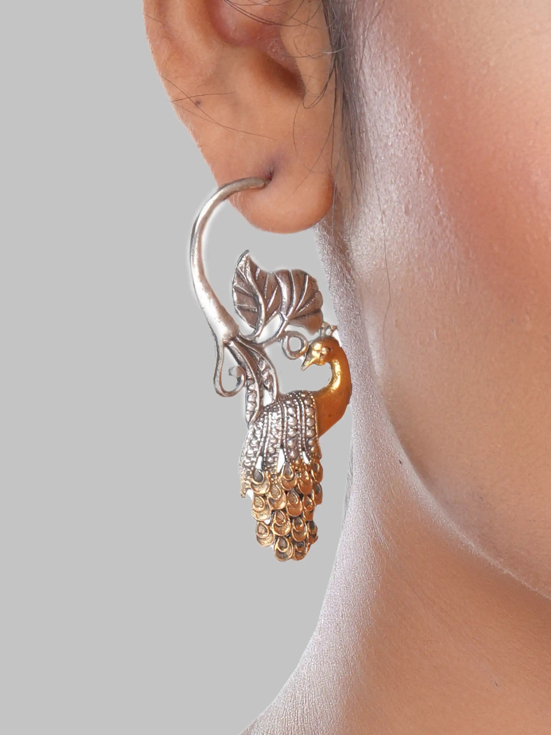 925 silver dual-tone peacock motif earrings with gold-plated feathers and oxidized leaf detailing