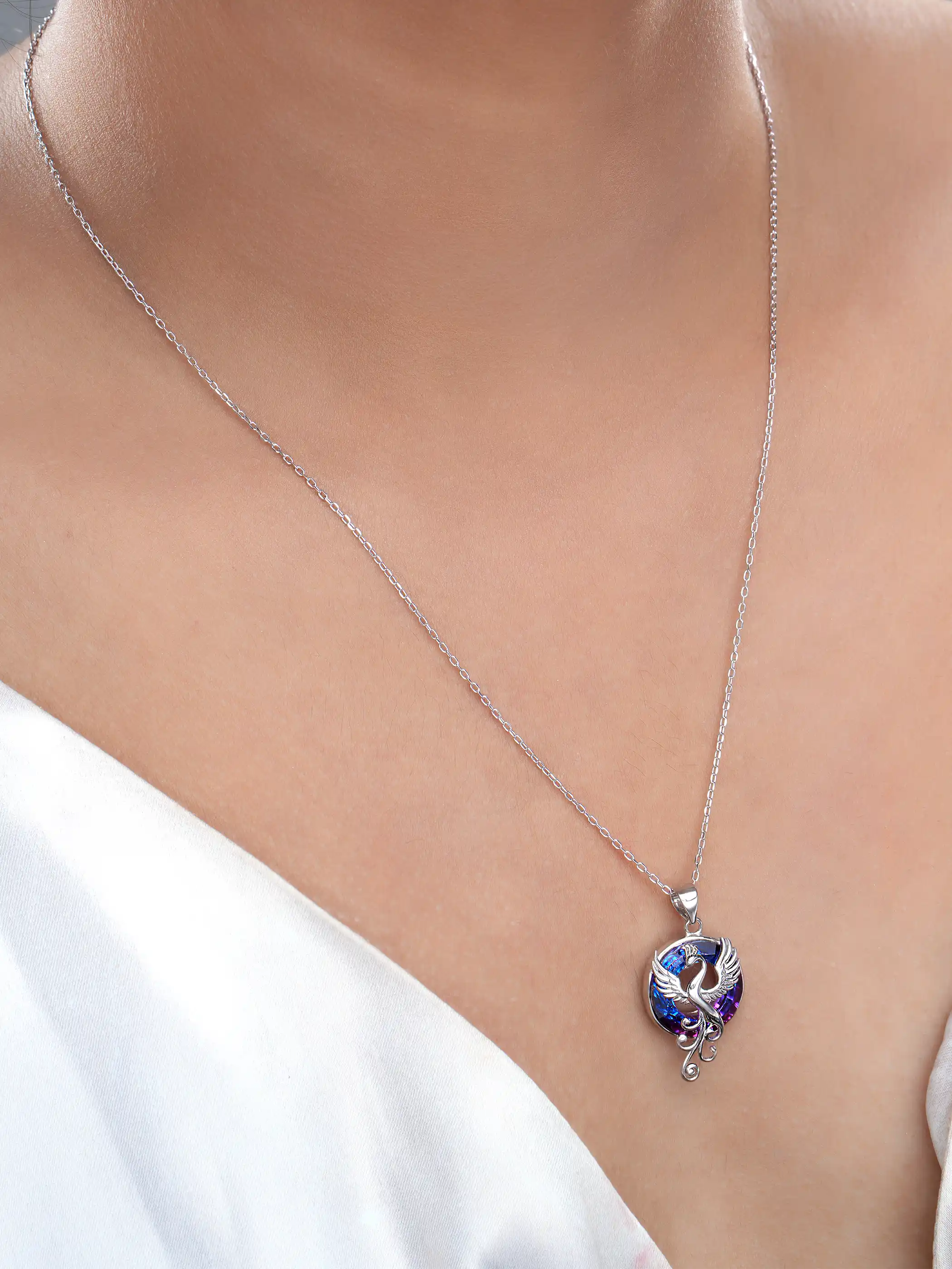 925 silver pendant necklace with phoenix bird design and round purple-blue crystal background on fine chain