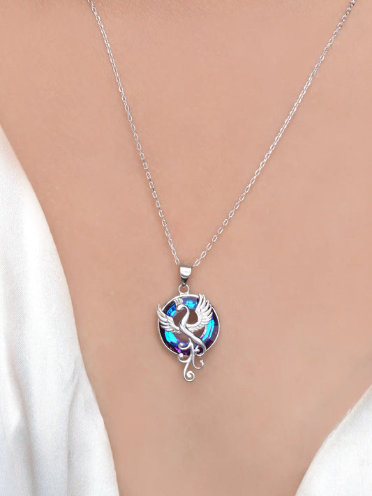 925 silver pendant necklace with phoenix bird design and round purple-blue crystal background on fine chain