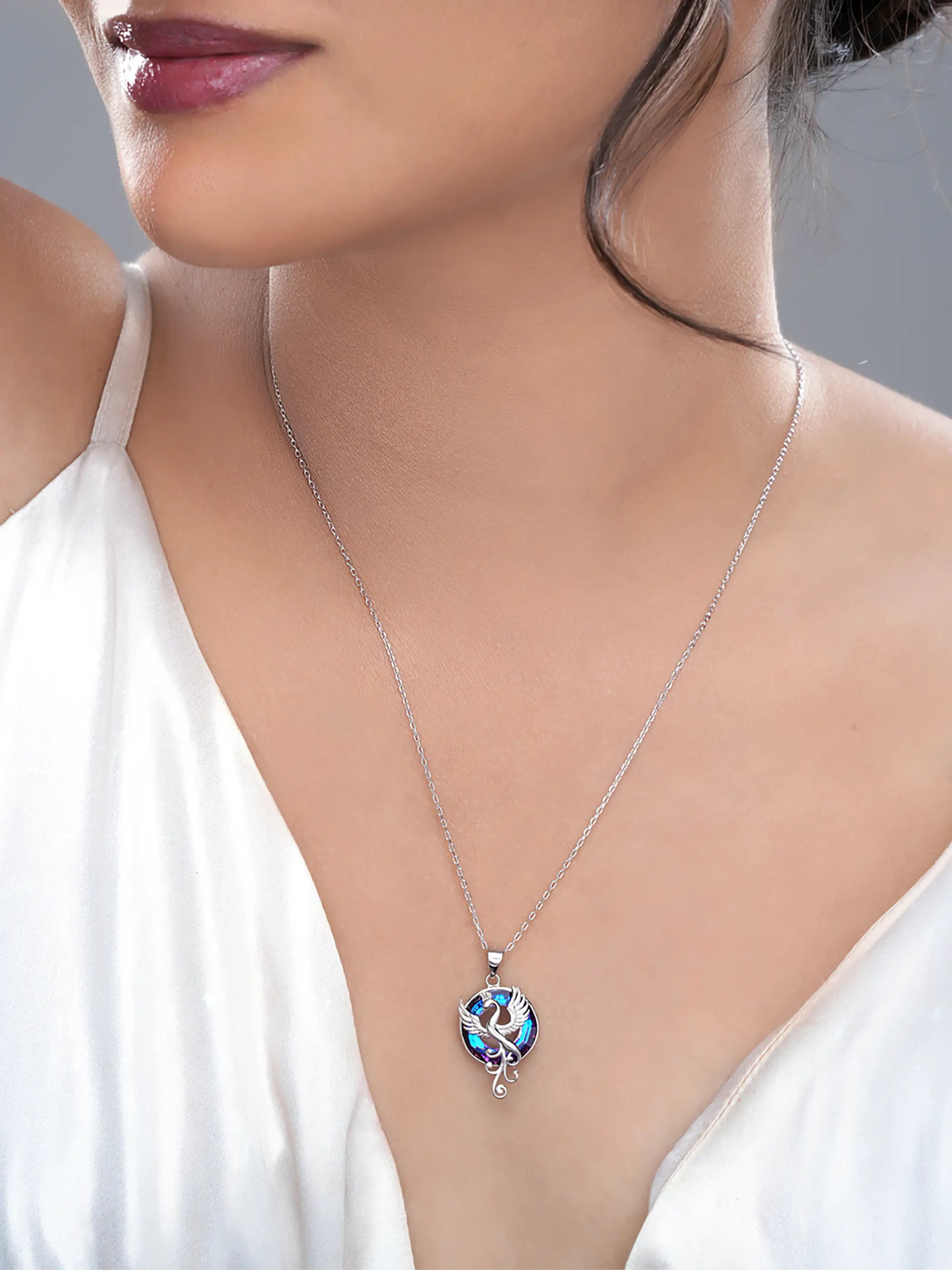 925 silver pendant necklace with phoenix bird design and round purple-blue crystal background on fine chain