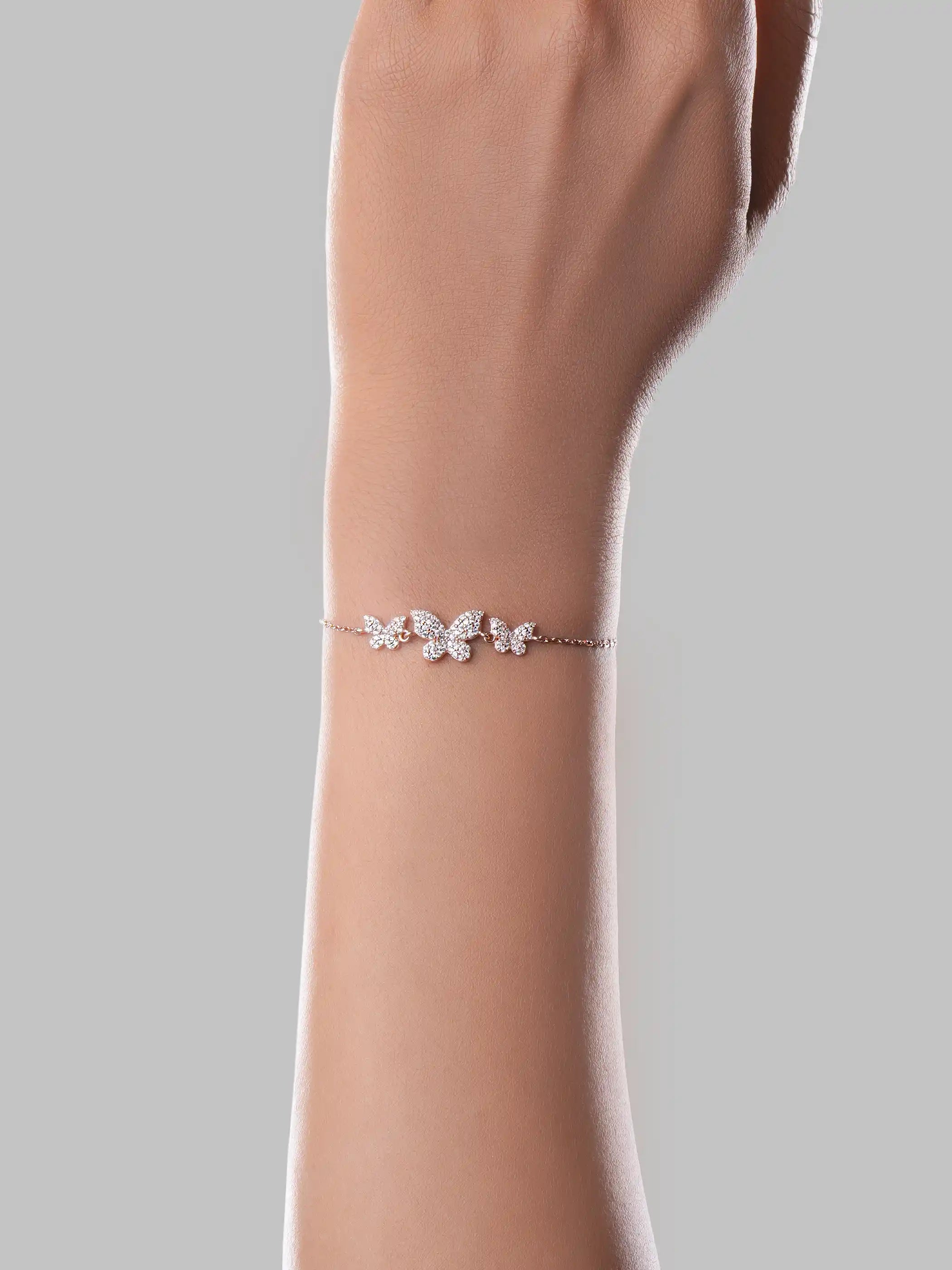 925 silver rose gold plated bracelet with three crystal-studded butterfly charms on delicate adjustable chain