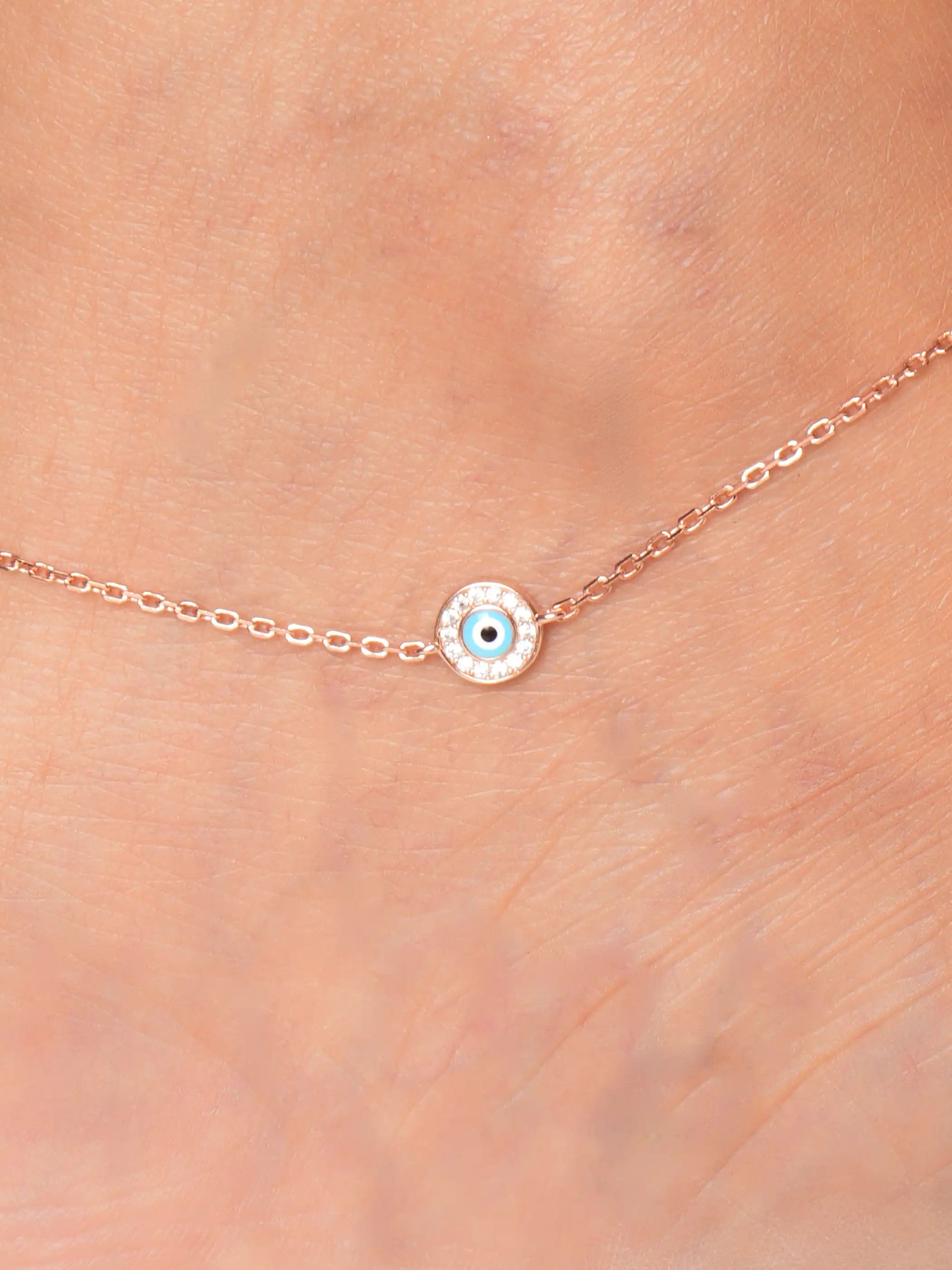 925 silver rose gold plated necklace with evil eye pendant, accented with blue enamel center and cubic zirconia border