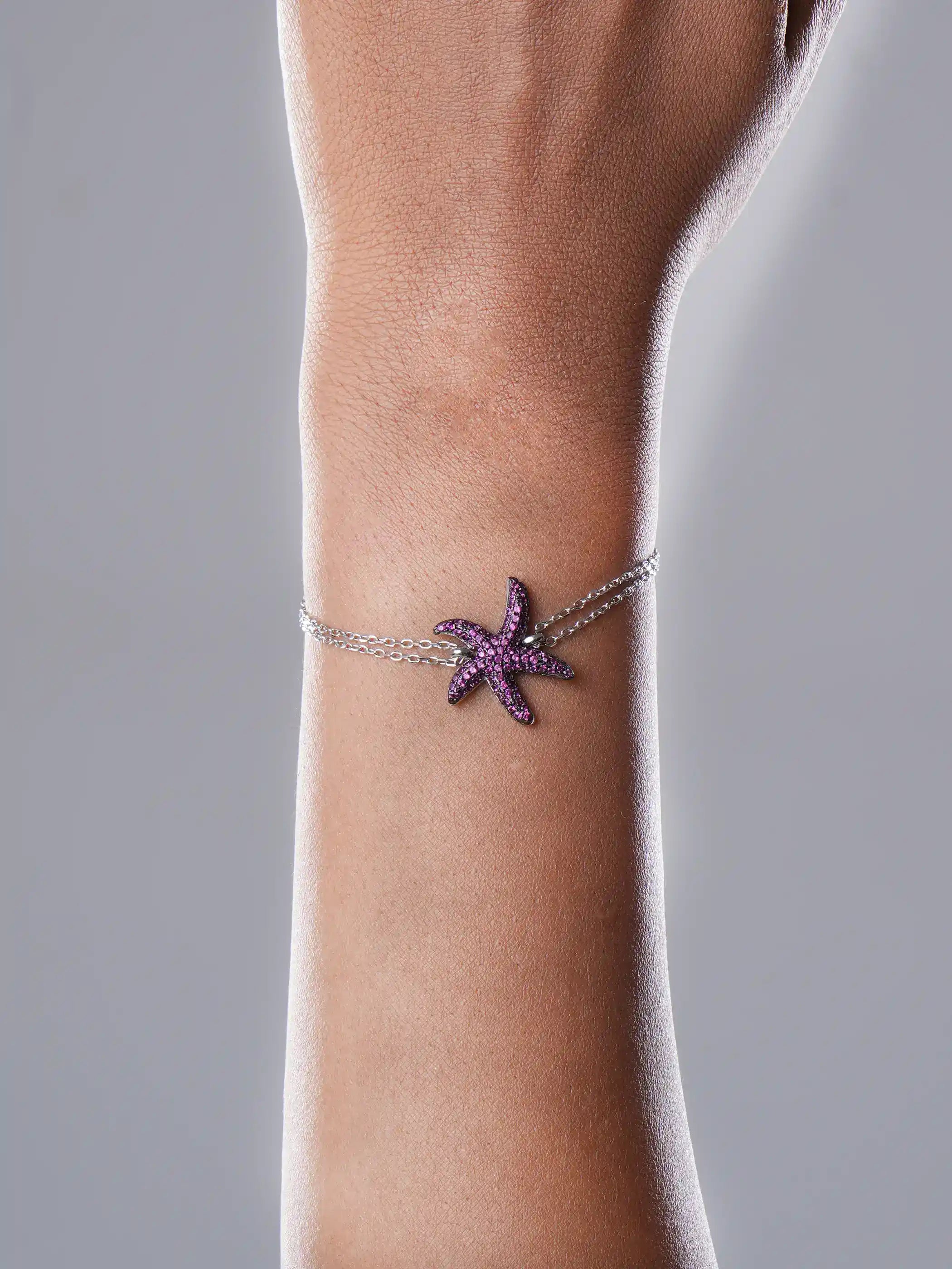 925 silver bracelet with pink stone-studded starfish charm and dual chain design