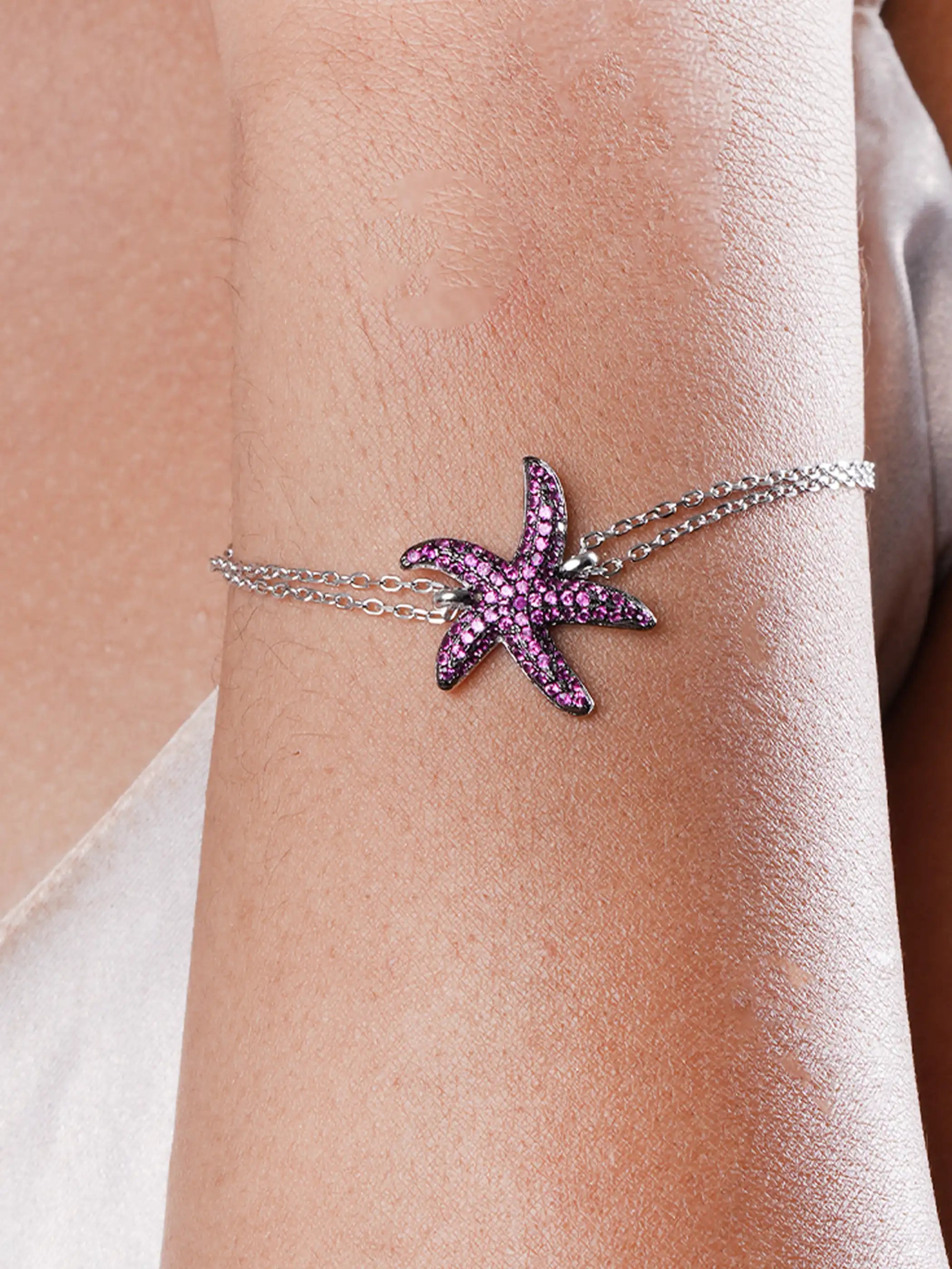 925 silver bracelet with pink stone-studded starfish charm and dual chain design
