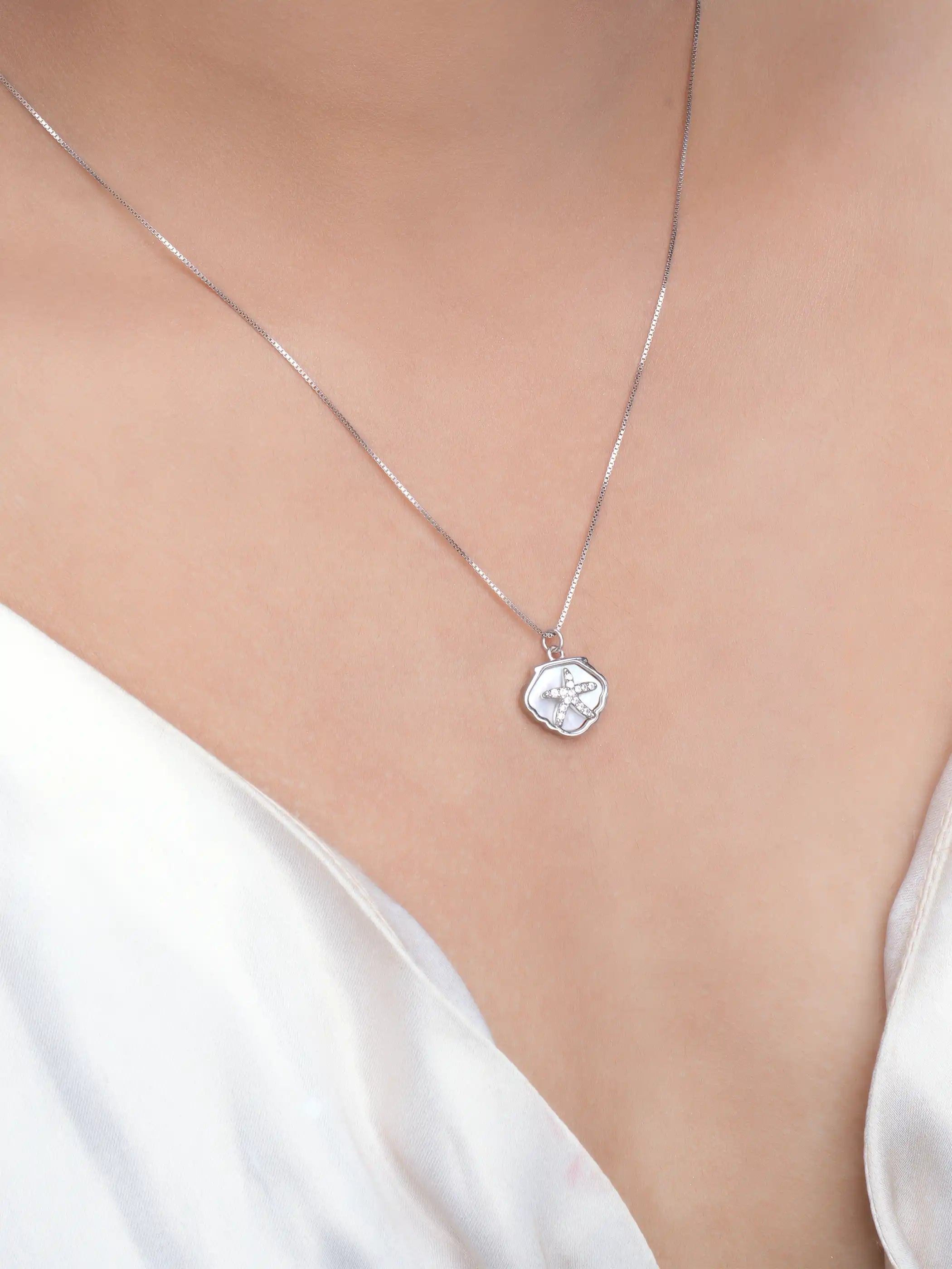925 silver starfish pendant necklace with crystal-studded detailing on a fine chain