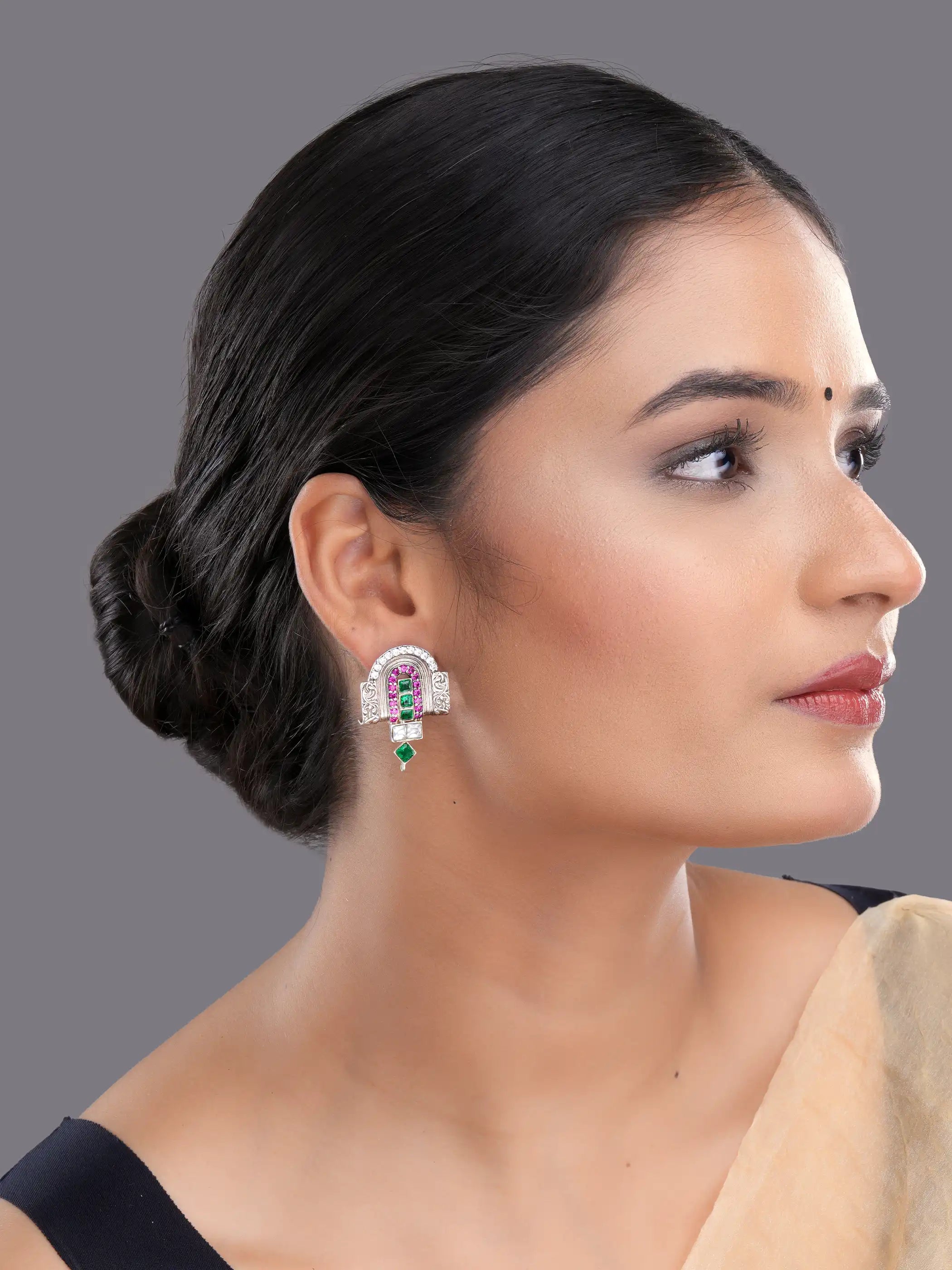 925 silver temple-inspired earrings with green emerald, ruby pink, and white stones in intricate design