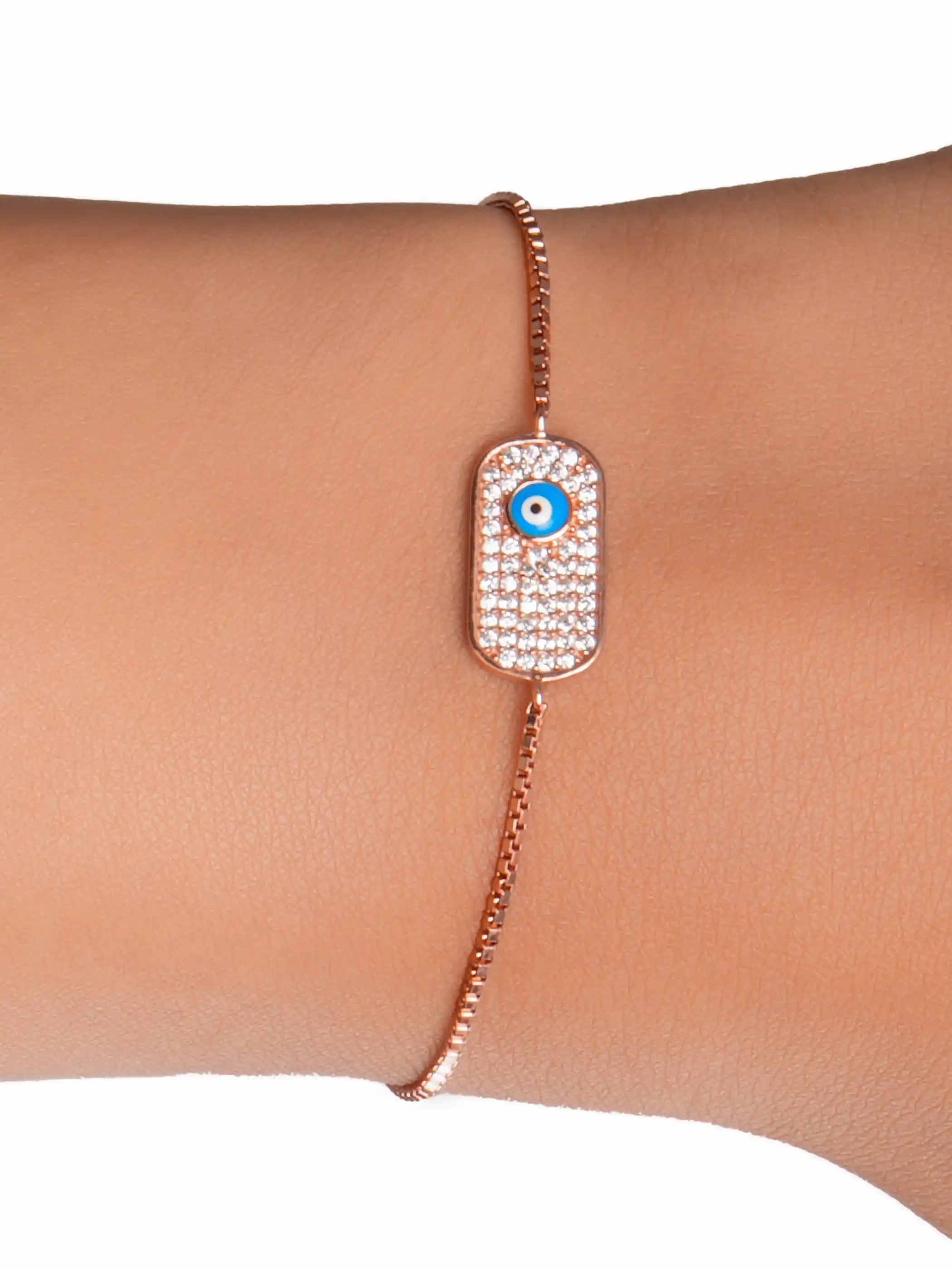 Rose gold plated 925 silver adjustable bracelet with rectangular cubic zirconia plate and blue evil eye charm