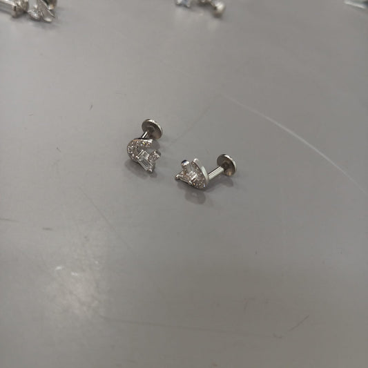 925 sterling silver stud earrings with clear-stone horseshoe outlines and rectangular accents, side view.