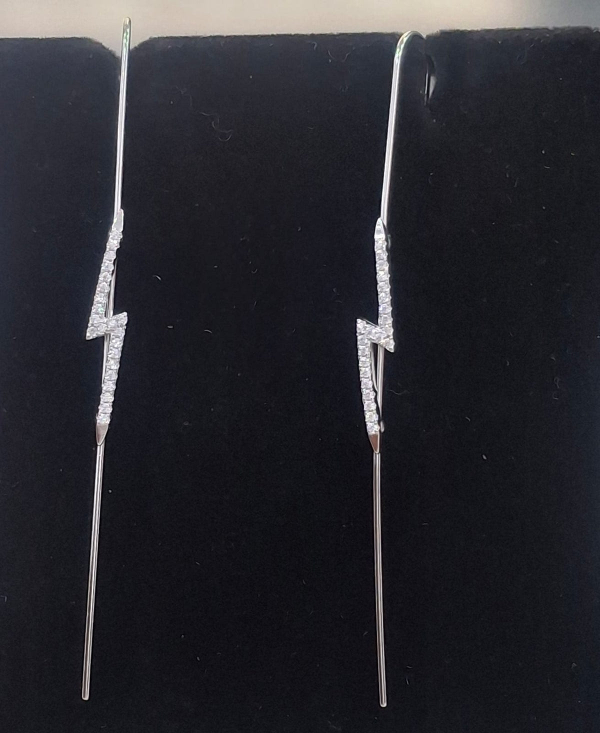 925 sterling silver ear needle pin with clear-stone lightning bolt, shown from front and side.