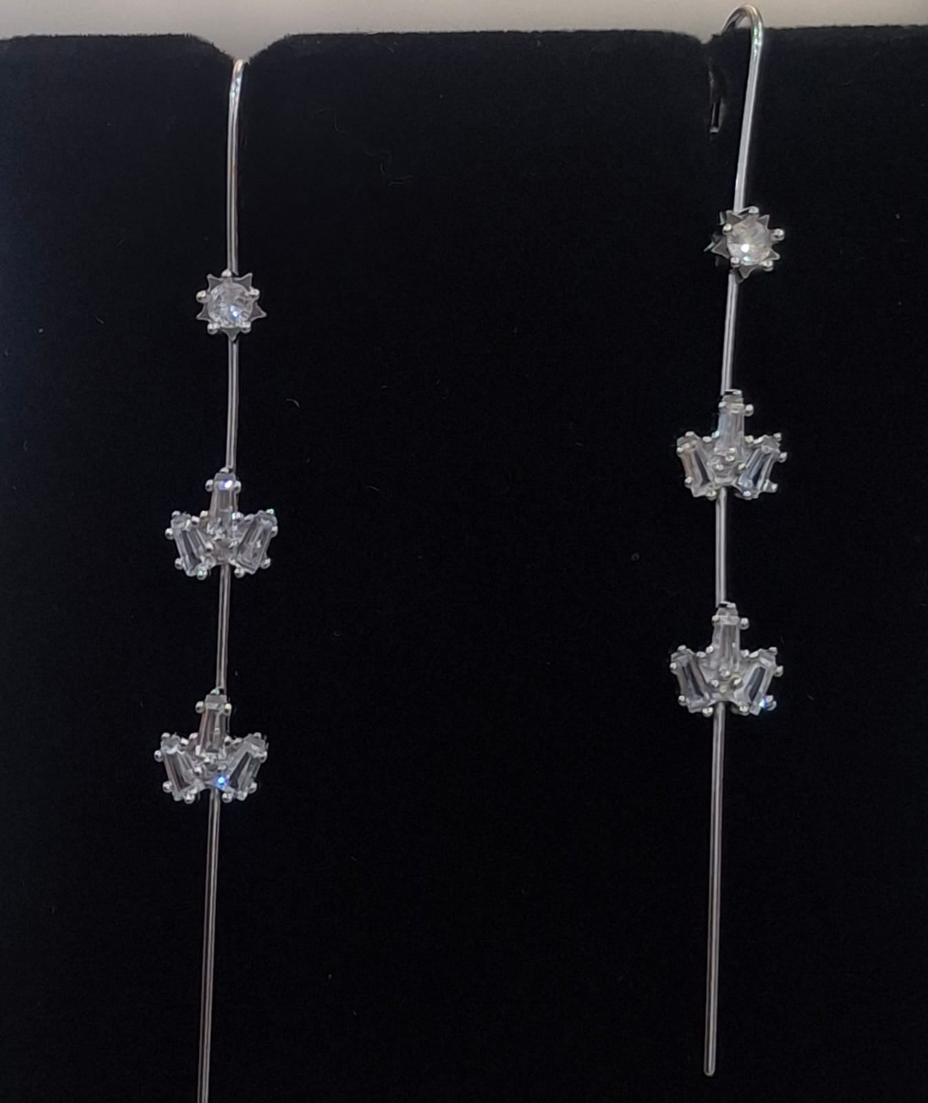925 sterling silver ear needle pin with round centre and geometric fan clusters, shown from front and side.