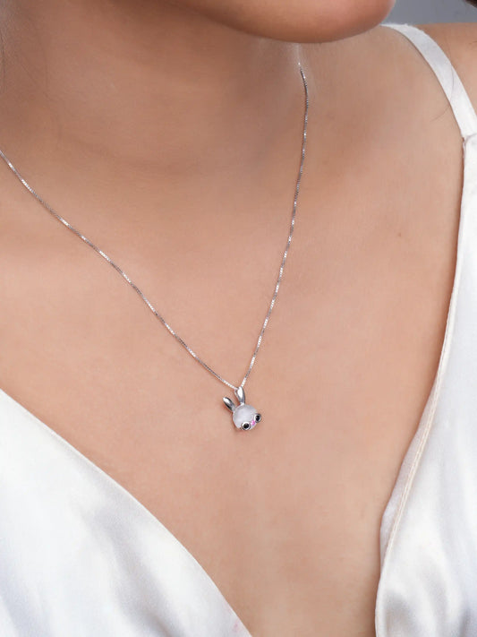 925 silver pendant necklace with bunny motif featuring pearl detail and pink gemstone eyes on sleek chain