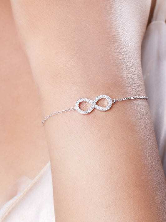 925 silver adjustable bracelet with sparkling infinity symbol charm encrusted with white stones