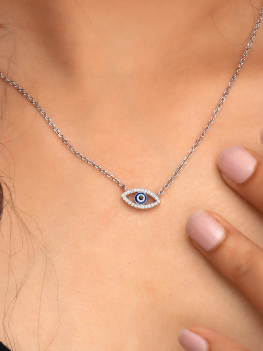 925 silver necklace with delicate chain and blue evil eye pendant in an open-eye design, symbolizing protection and style