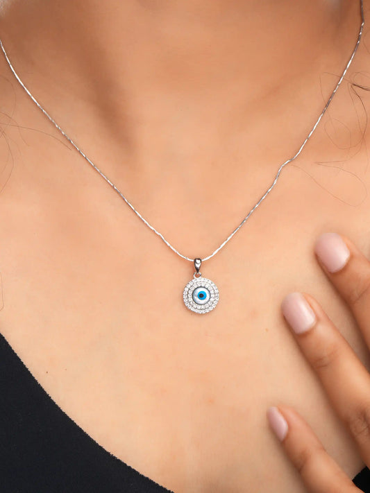 925 silver round pendant with blue evil eye center and crystal-studded halo for a bold protective charm