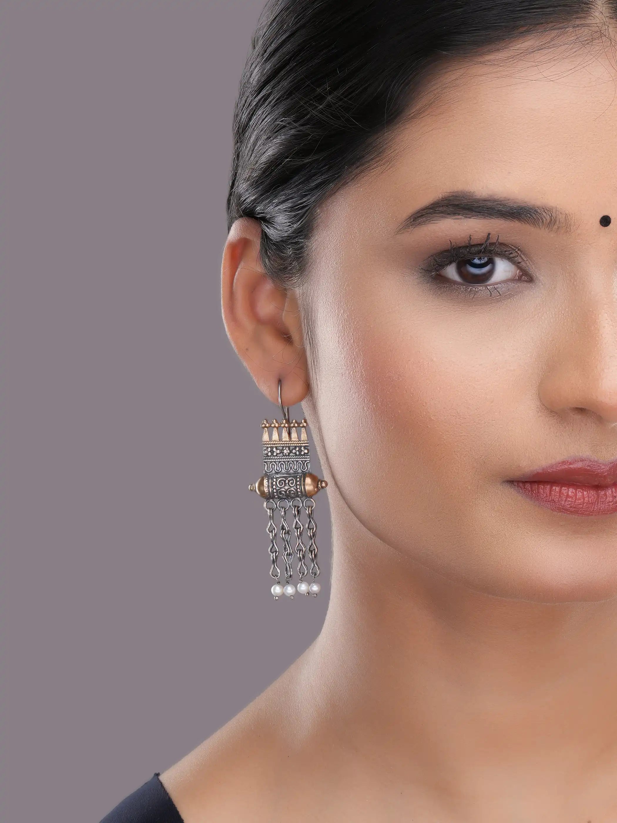 925 silver temple motif drop earrings with gold accents, oxidized detailing, and dangling pearl chains